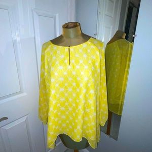 Yellow and white flowing blouse